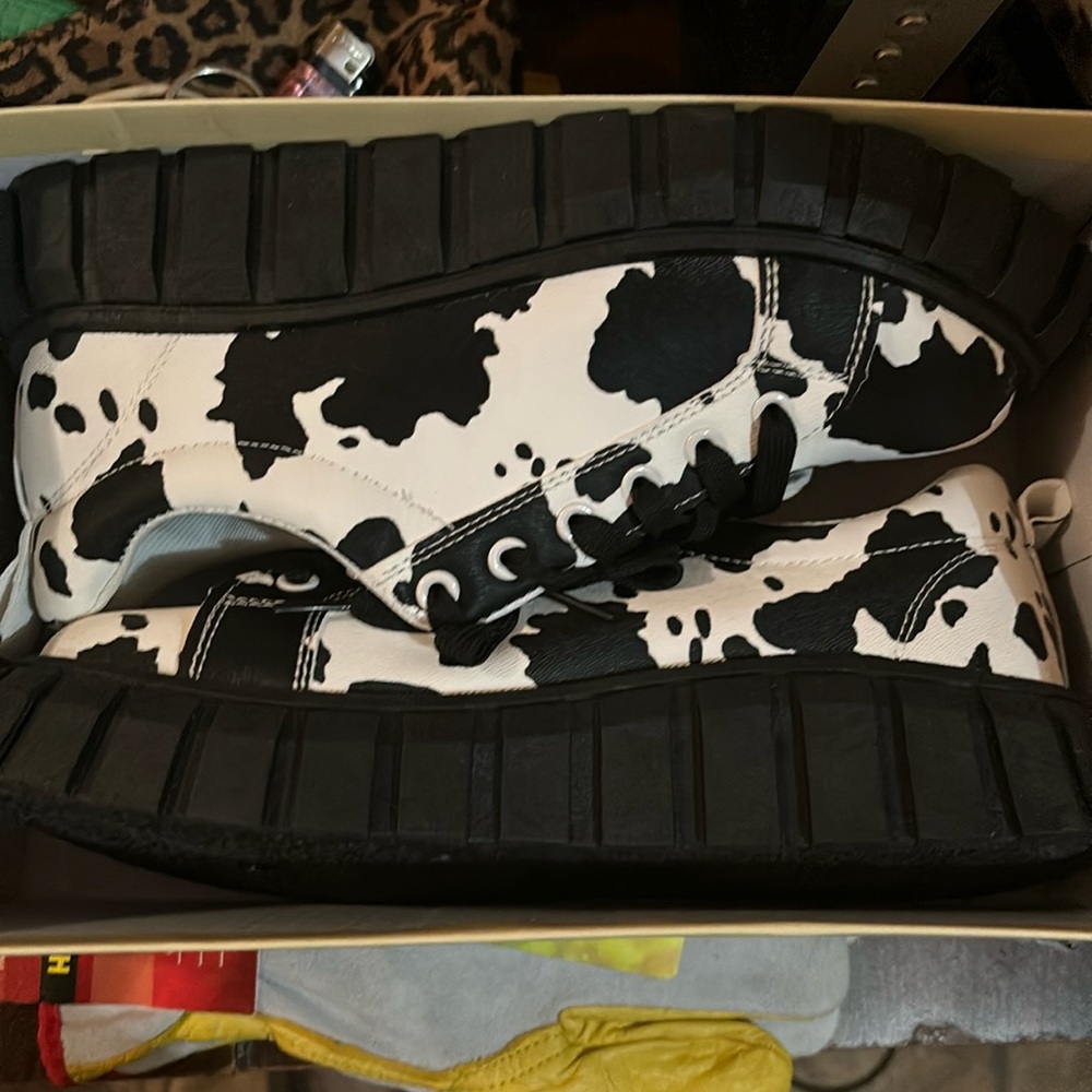 Cow print platform sneakers.   Size 10 but fits like 9.5